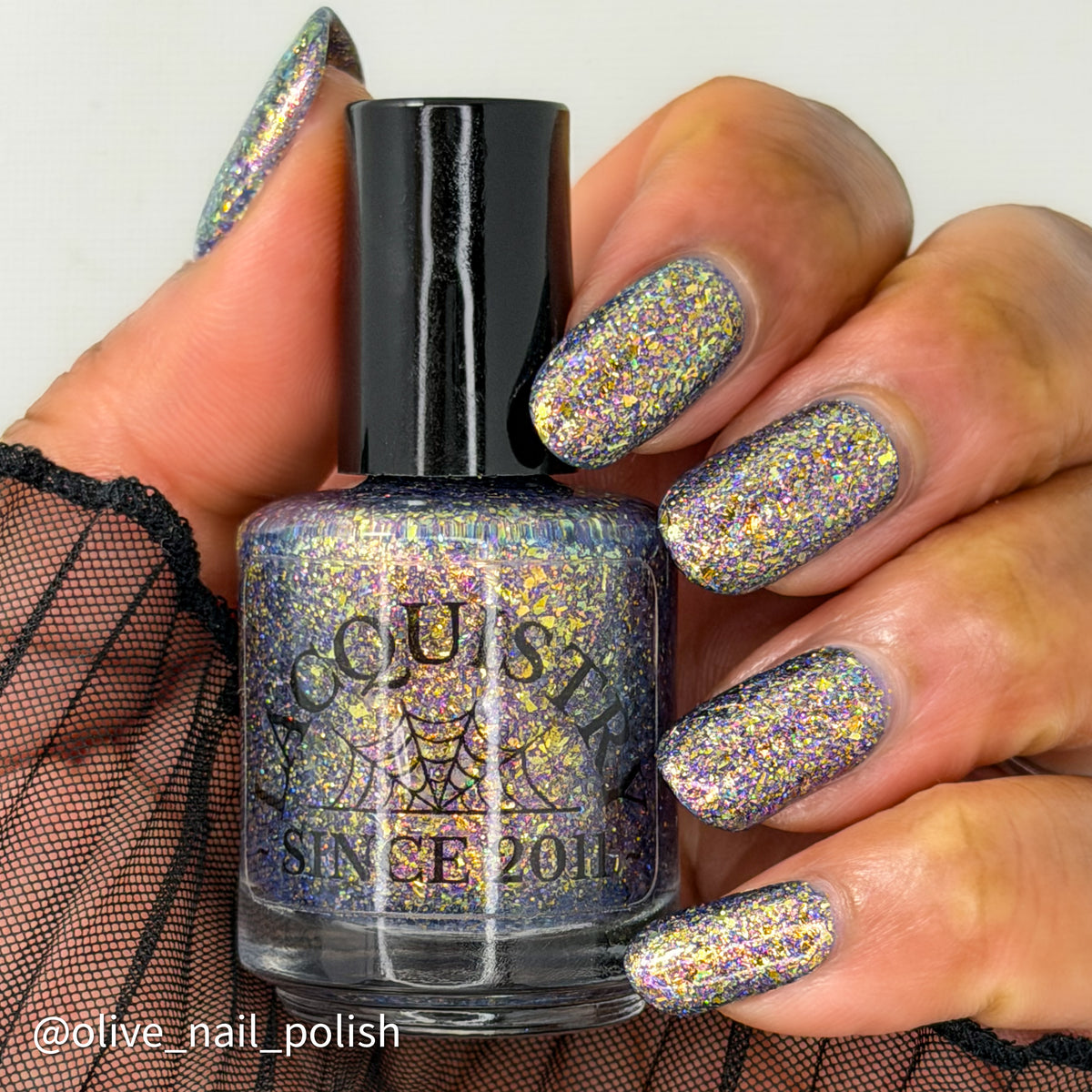 flakie gold and purple nail polish