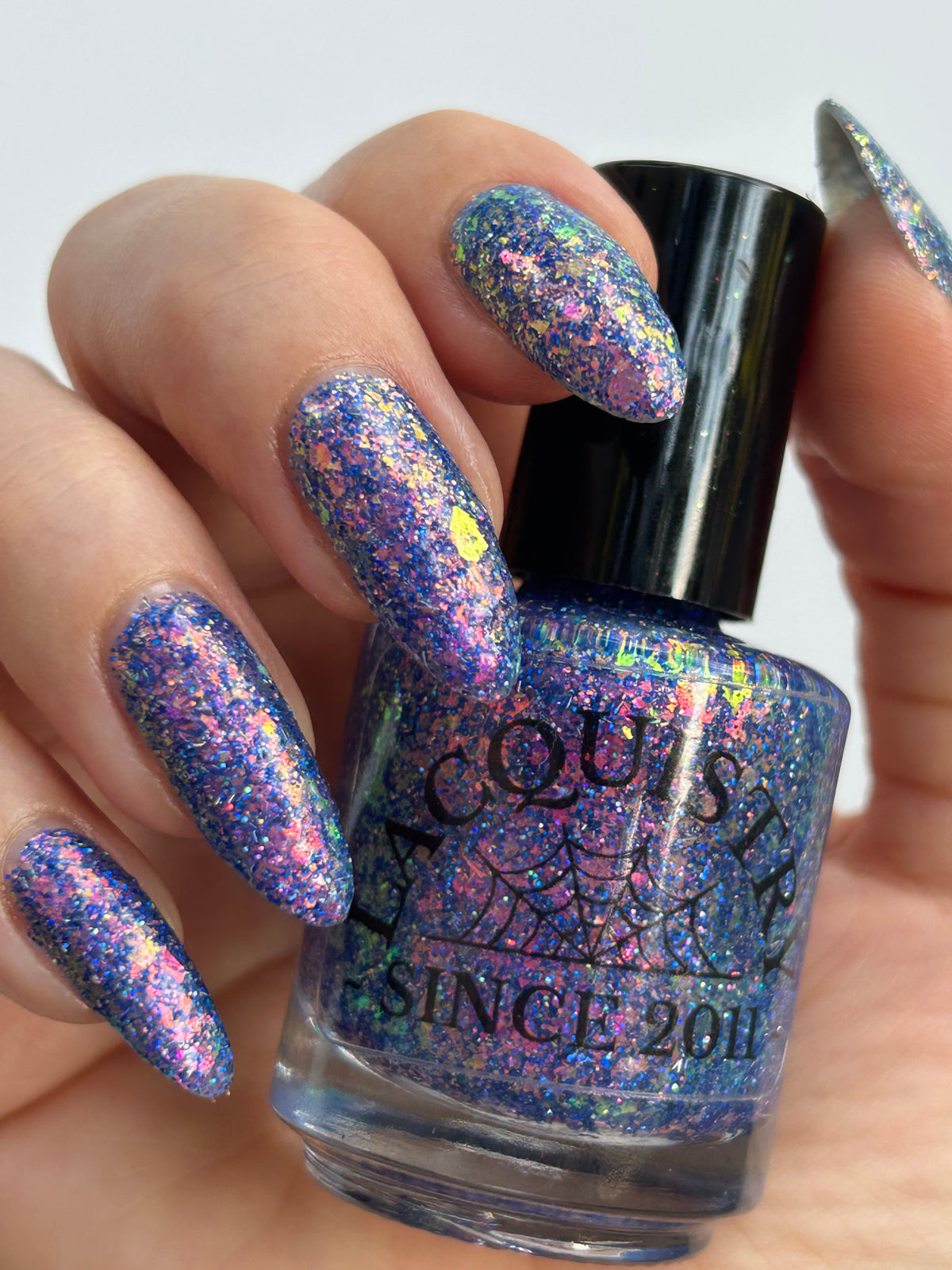 Bright Blue and purple glitter flakie Lacquistry polish Thriver Not survivor