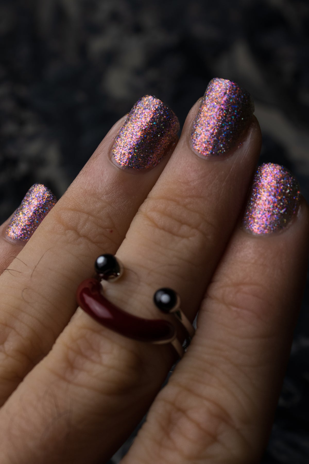 lavender sparkle and holo glitter pink nail polish with ring