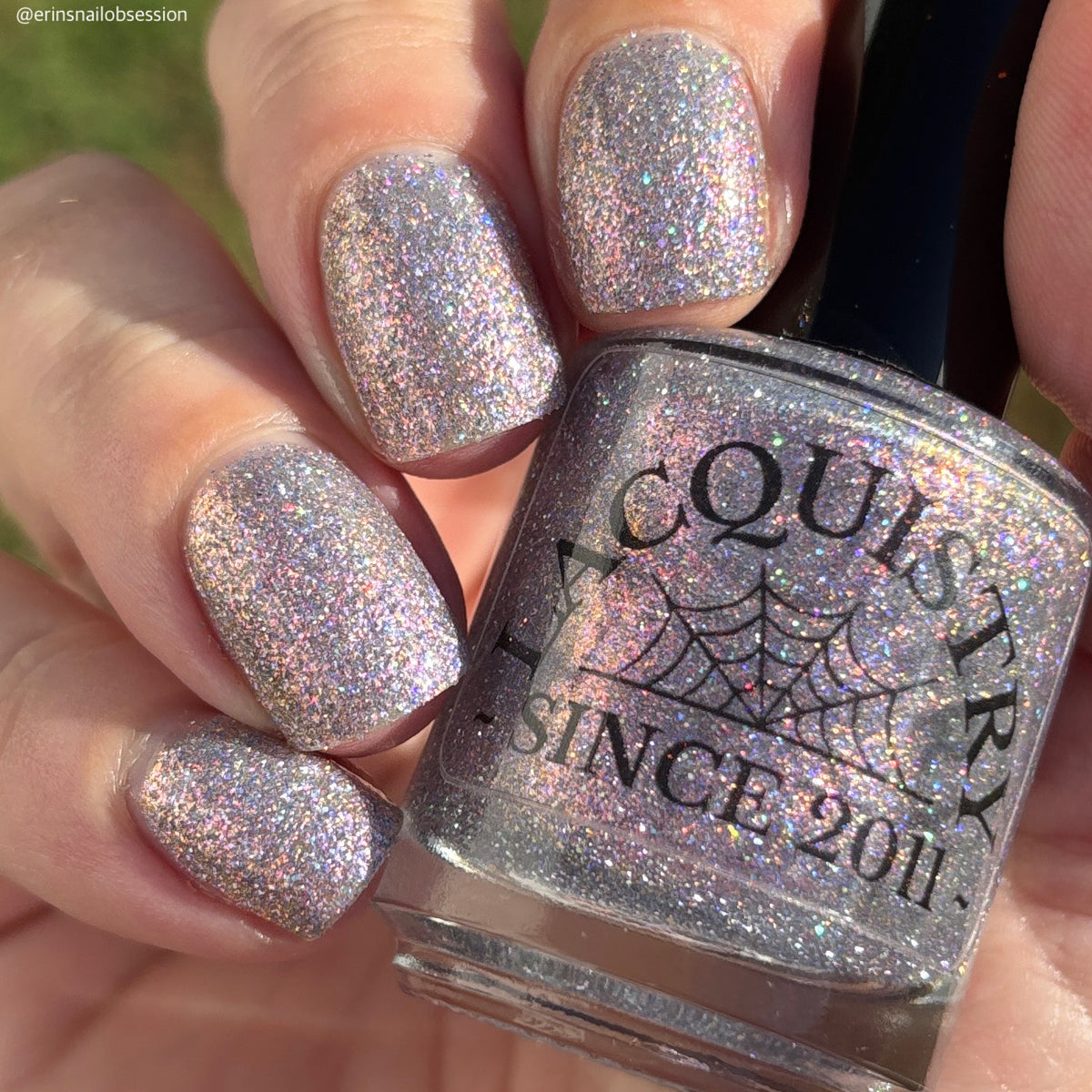 lavender sparkle and holo glitter pink nail polish bottle says LACQUISTRY SINCE 2011