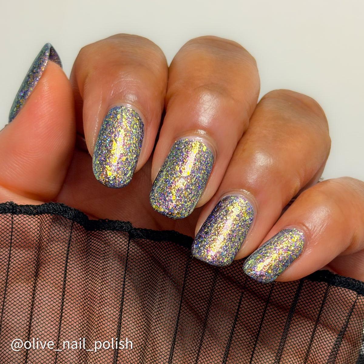 flakie gold and purple nail polish