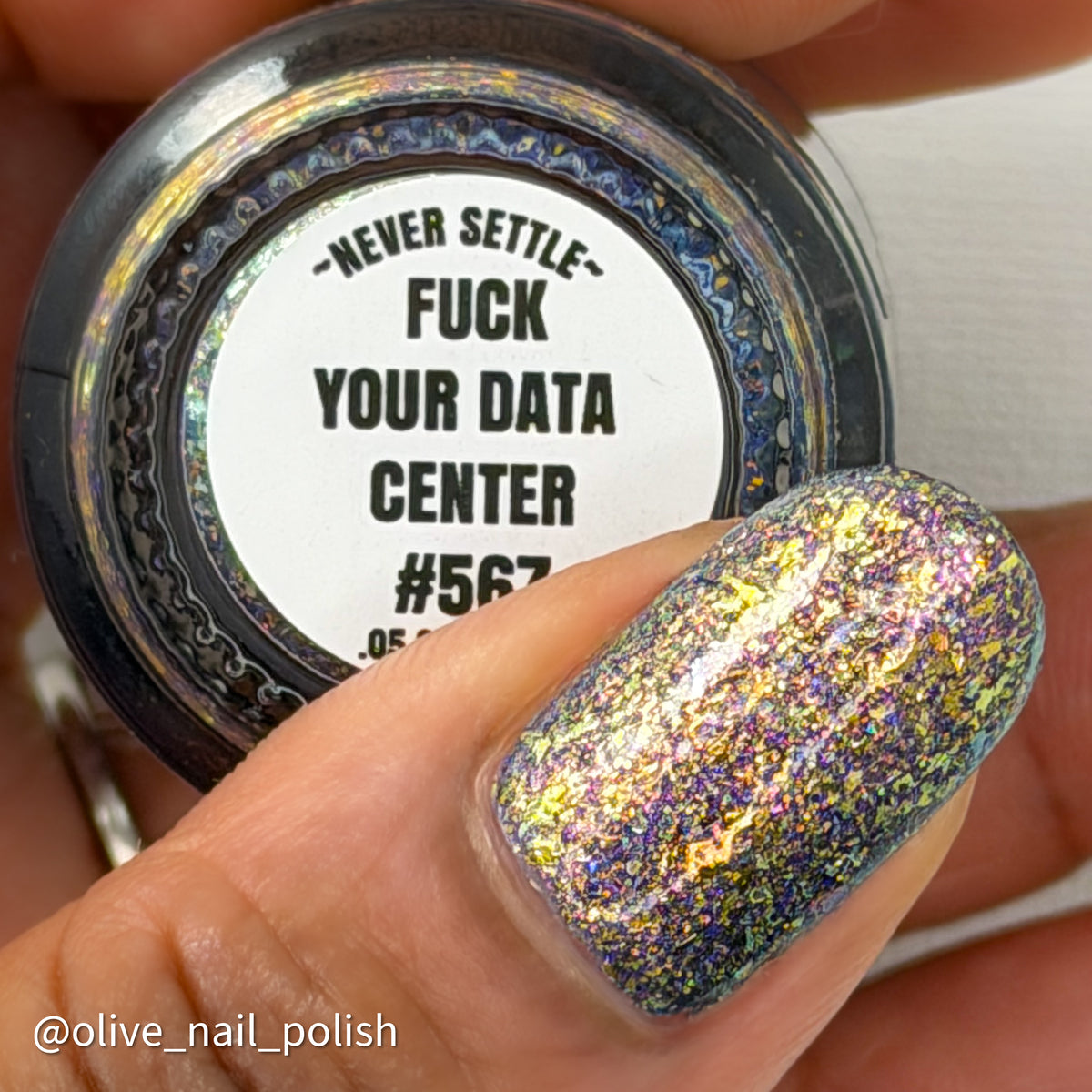 flakie gold and purple nail polish Fuck Your Data Center label