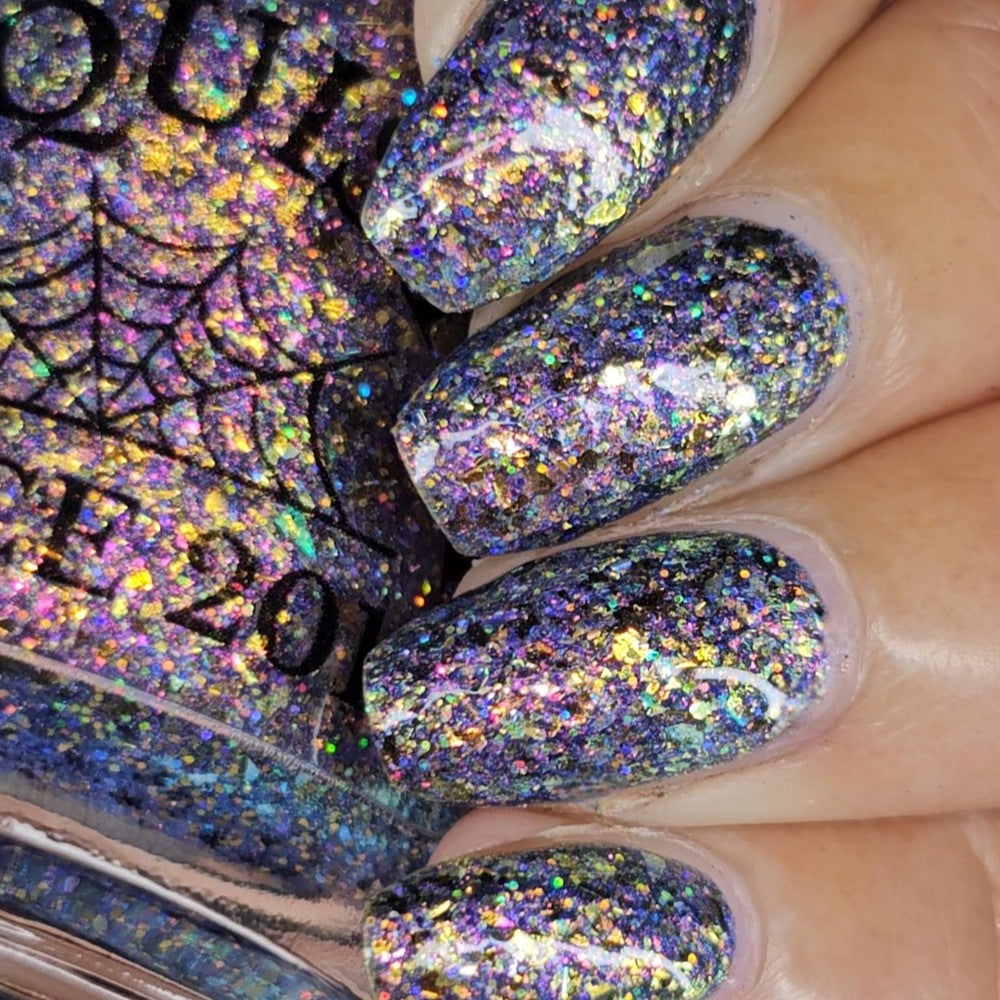 flakie gold and purple nail polish