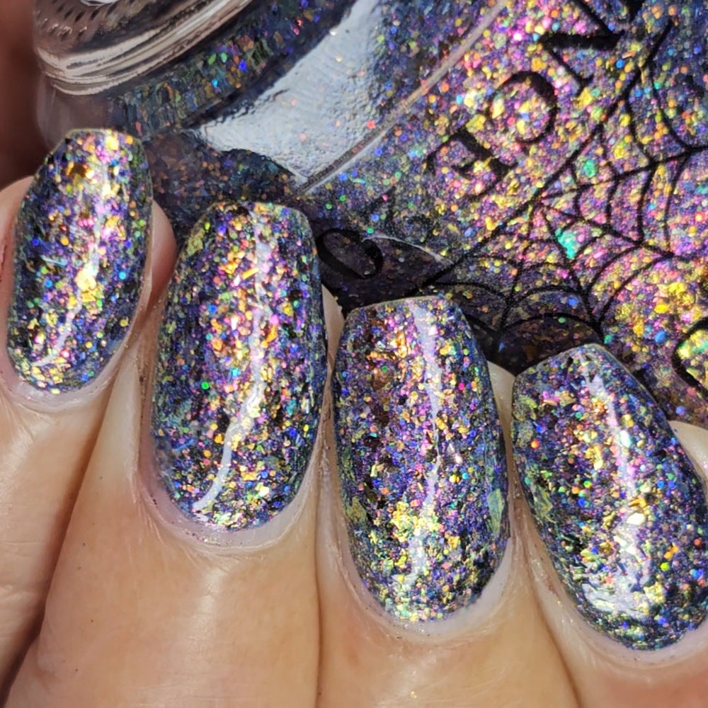 flakie gold and purple nail polish