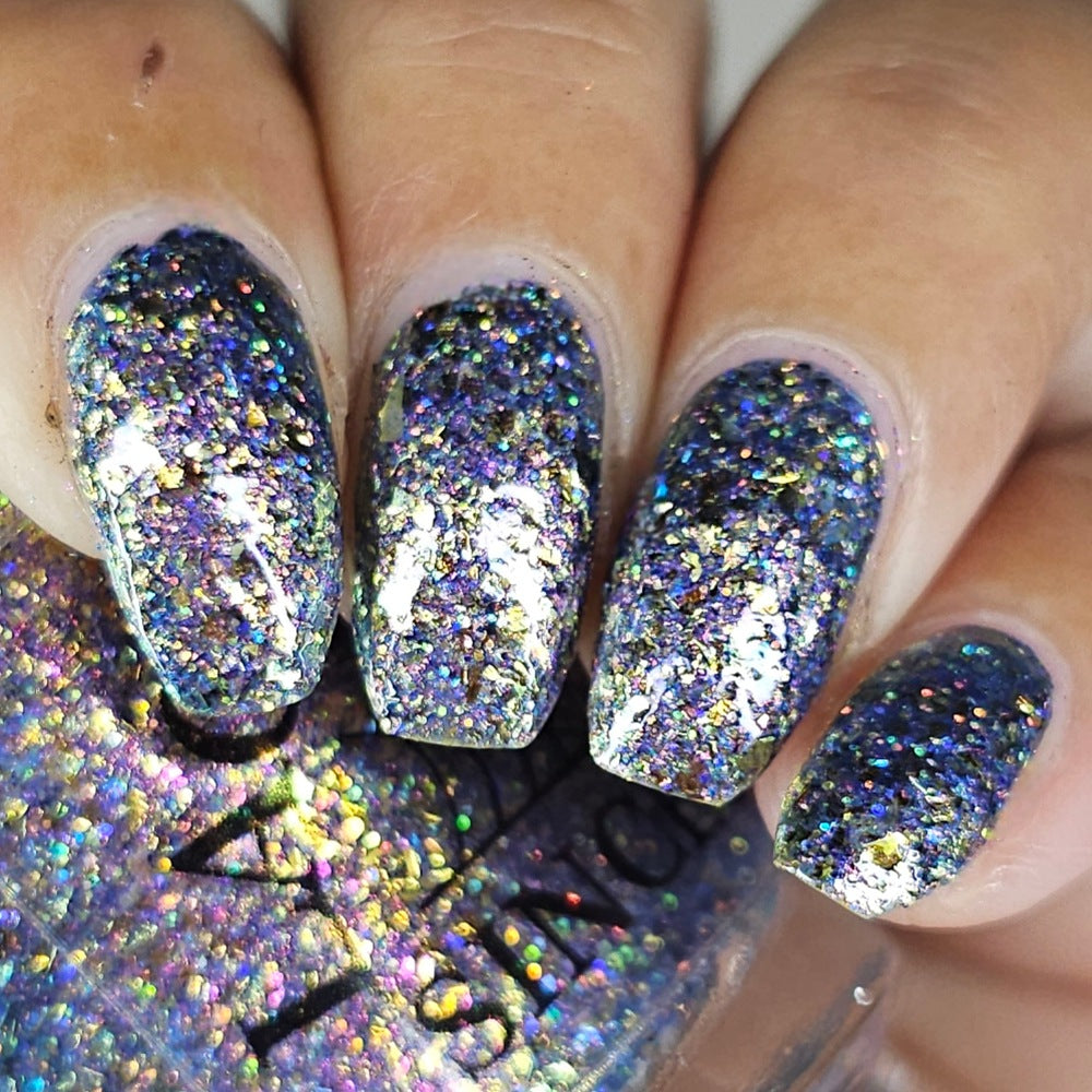 flakie gold and purple nail polish