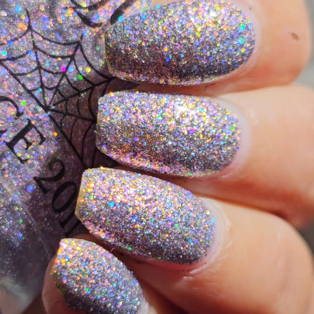 lavender sparkle and holo glitter pink nail polish 