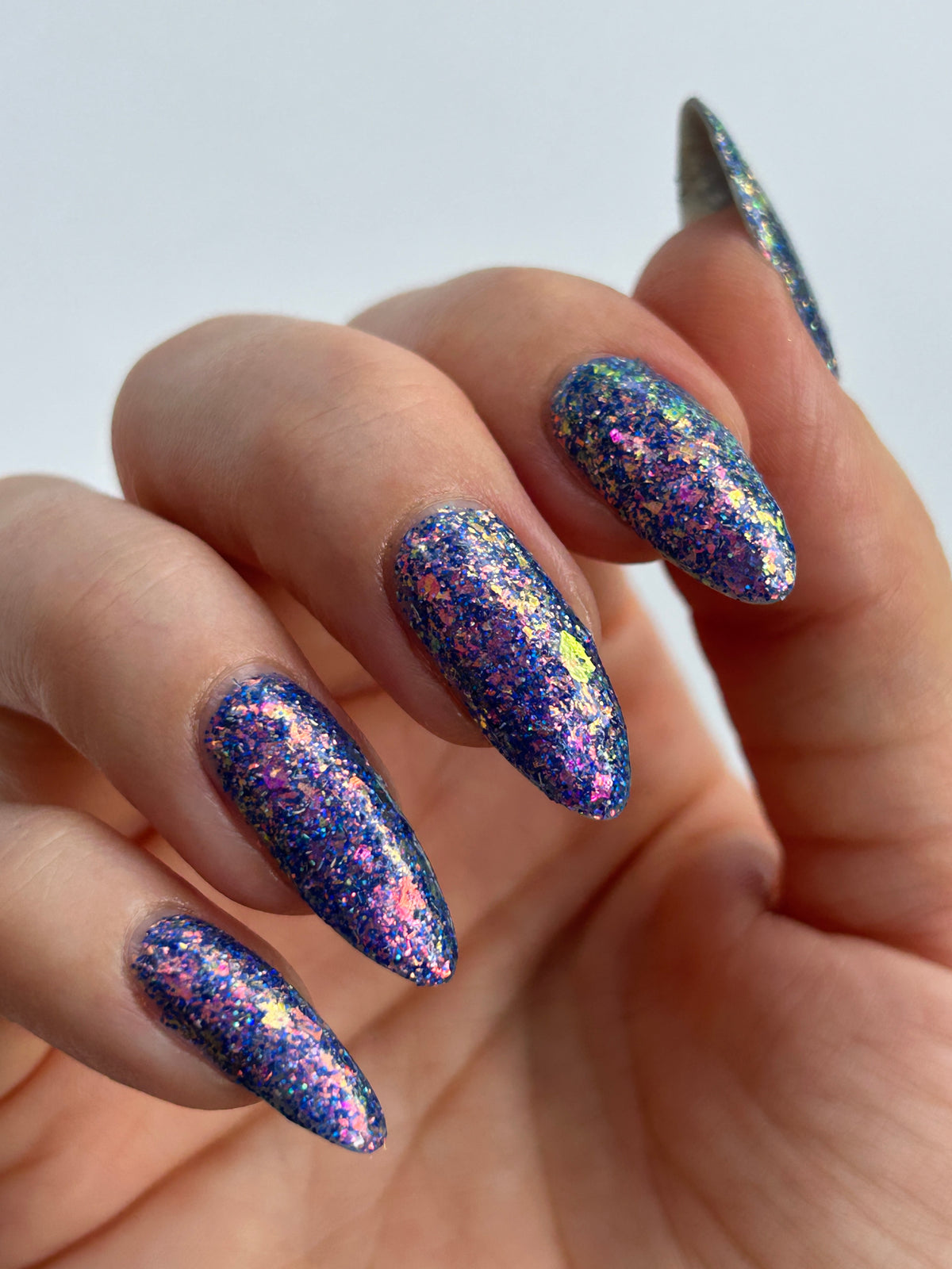 Bright Blue and purple glitter  flakie Lacquistry polish Thriver Not survivor
