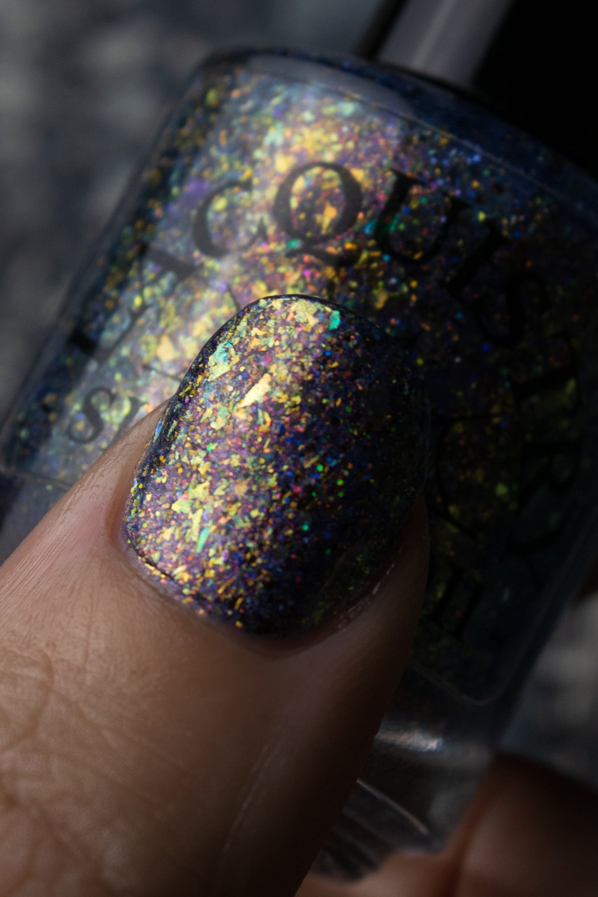 flakie gold and purple nail polish