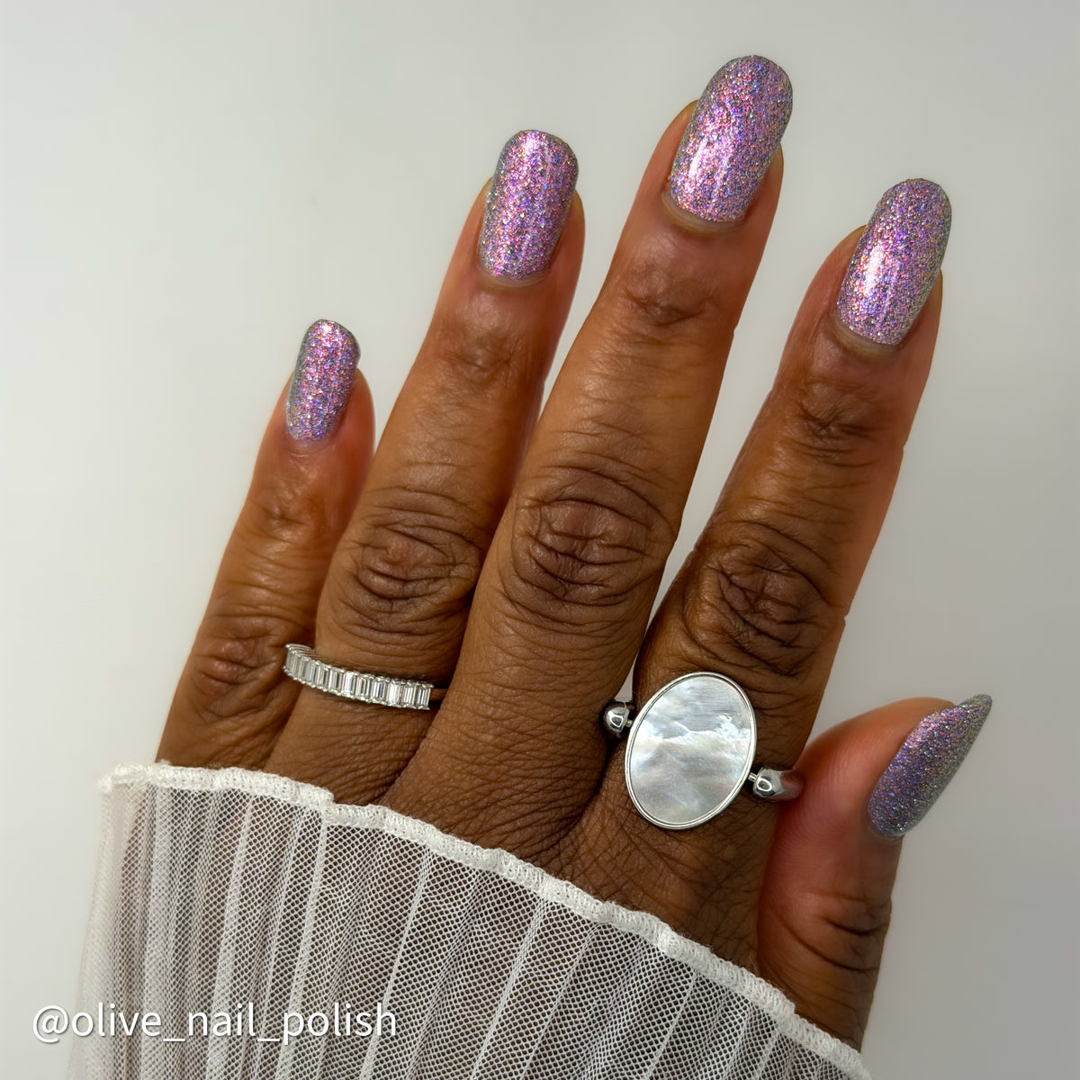 lavender sparkle and holo glitter pink nail polish 