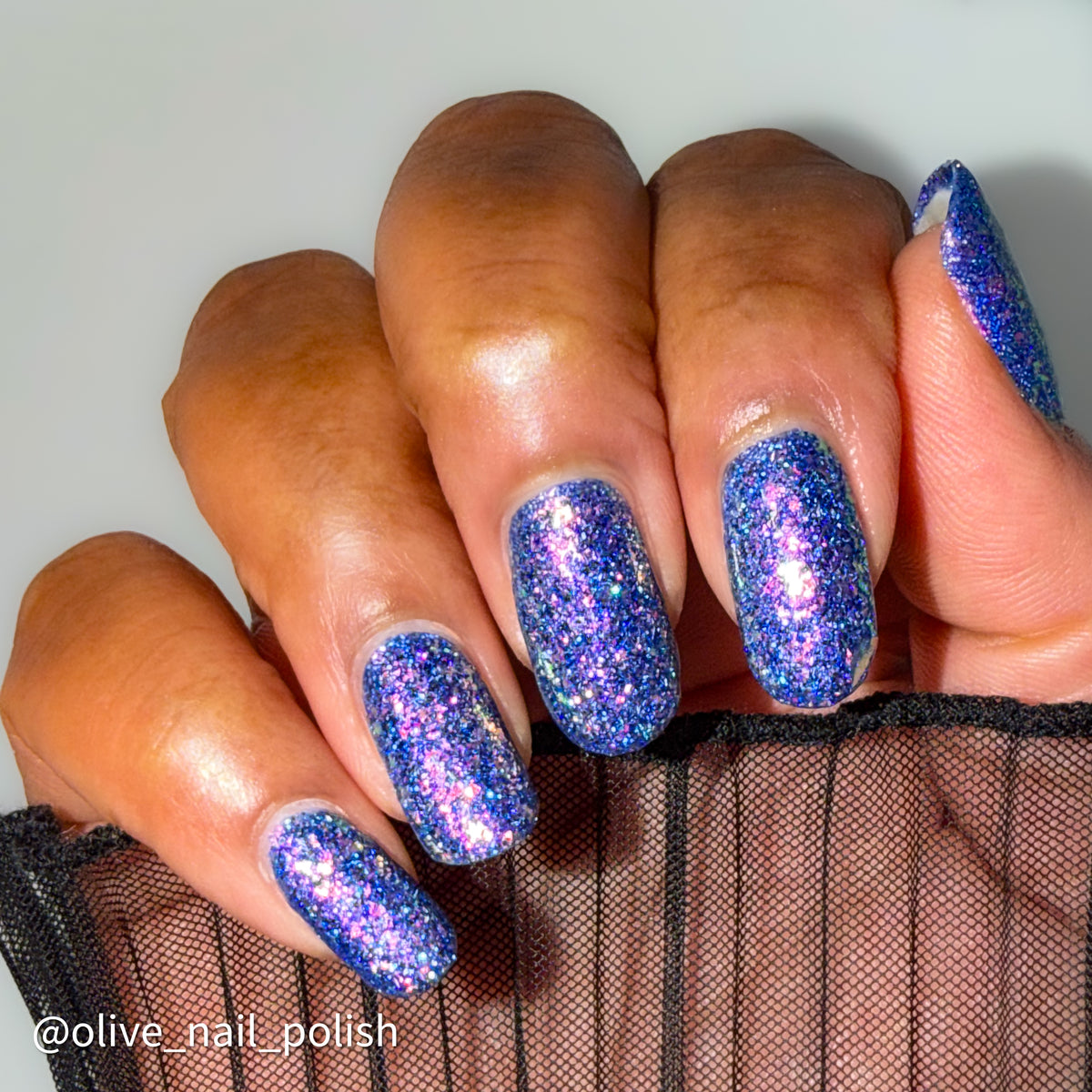 Bright Blue and purple glitter  flakie Lacquistry polish Thriver Not survivor