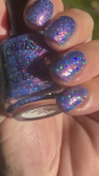 Bright Blue and purple glitter  flakie Lacquistry polish Thriver Not survivor sparkling in the sun and shade